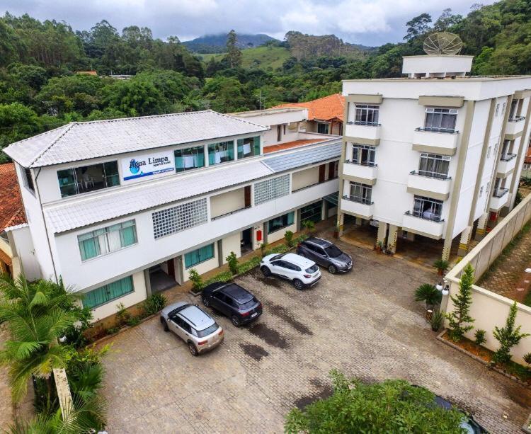Apart Hotel Agua Limpa Prados Extérieur photo